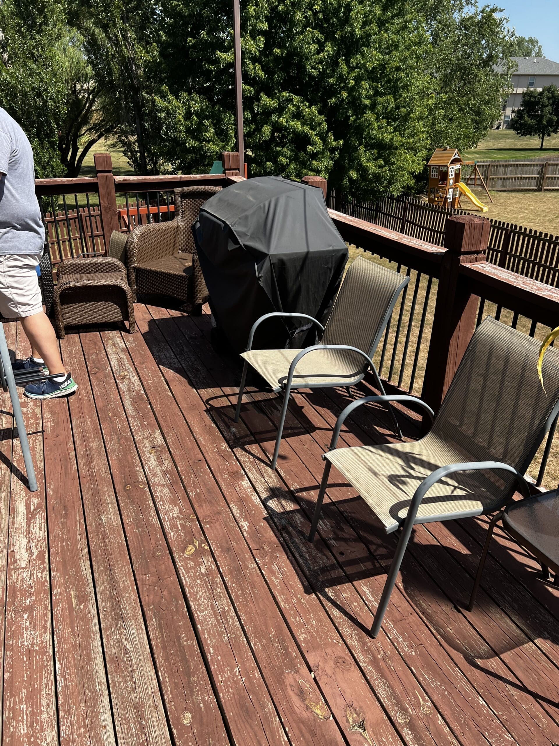 Weathered deck before restoration in Shawnee, Kansas