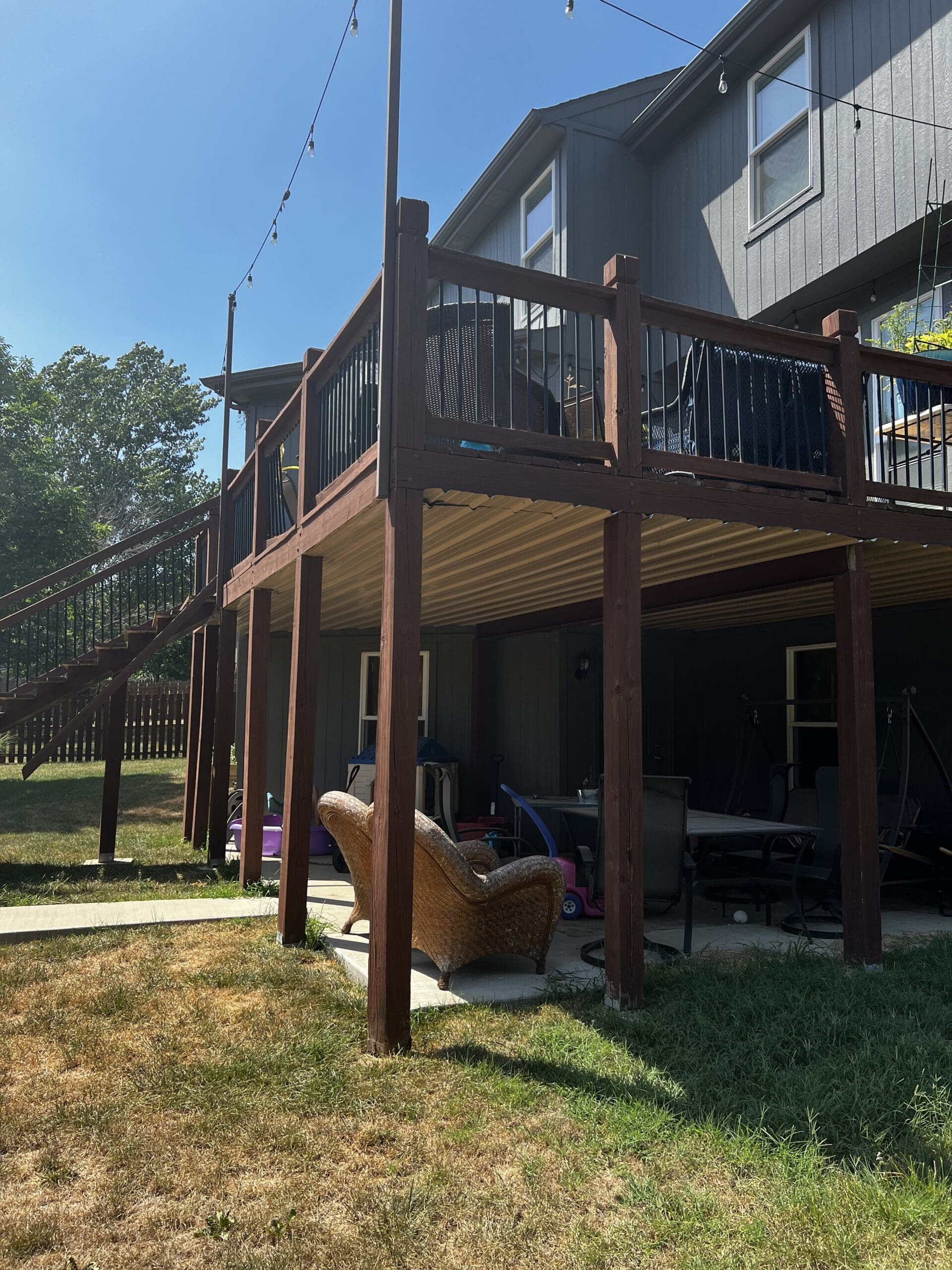 Old deck surface before restoration project in Shawnee, KS
